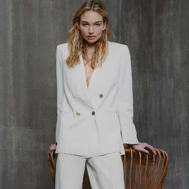 Alberta Ferretti brand image, a woman with a white suit