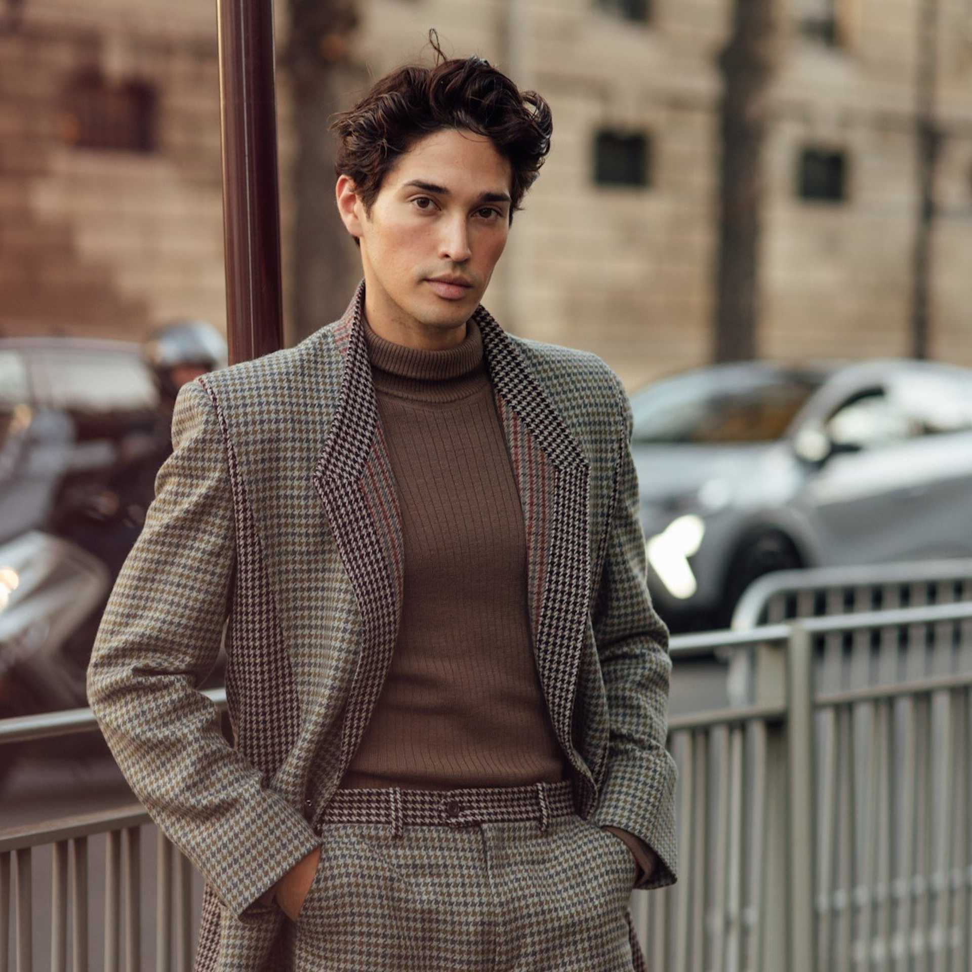 man in checked outfit